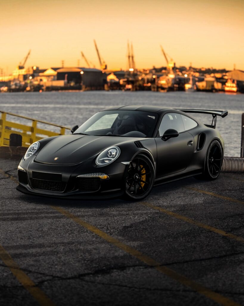 black porsche 911 on road during daytime. Best Aftermarket Wheels for Porsche 911